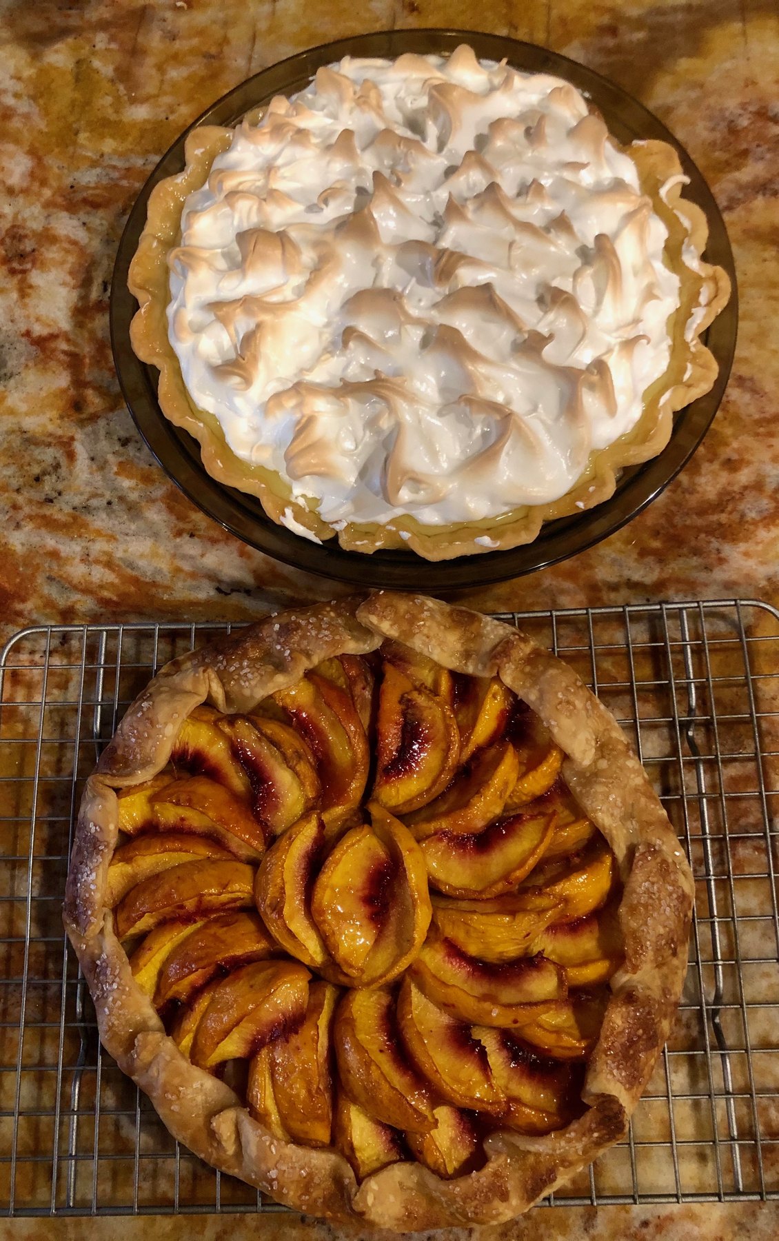 Lemon meringue pie and peach tart