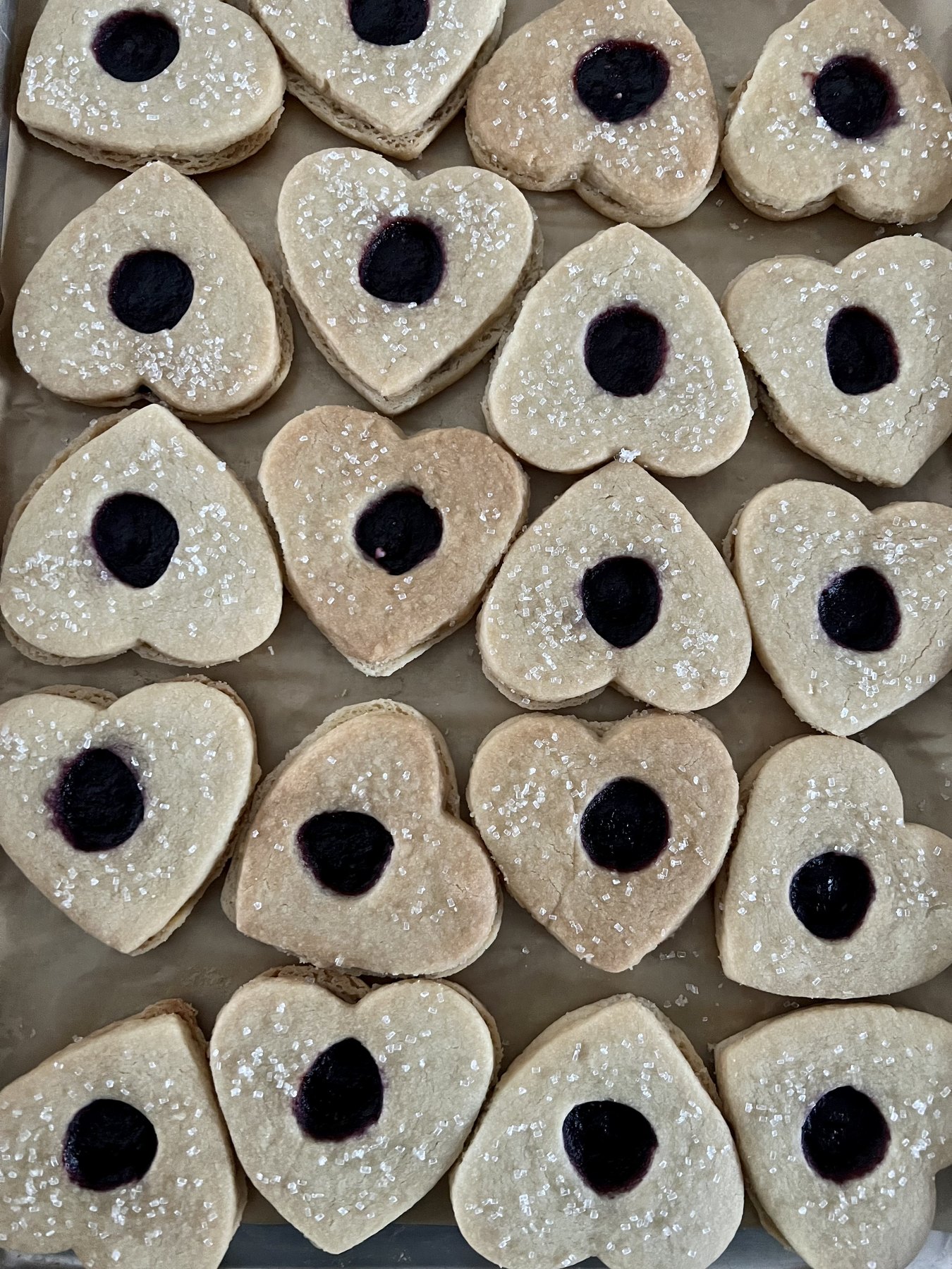 Heart-shaped Linzer tarts with jam centers